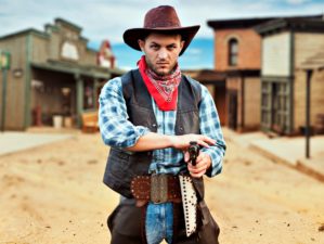 Featured | Cowboy with revolver, gunfight in texas country | The Real Science Behind A Gunfight