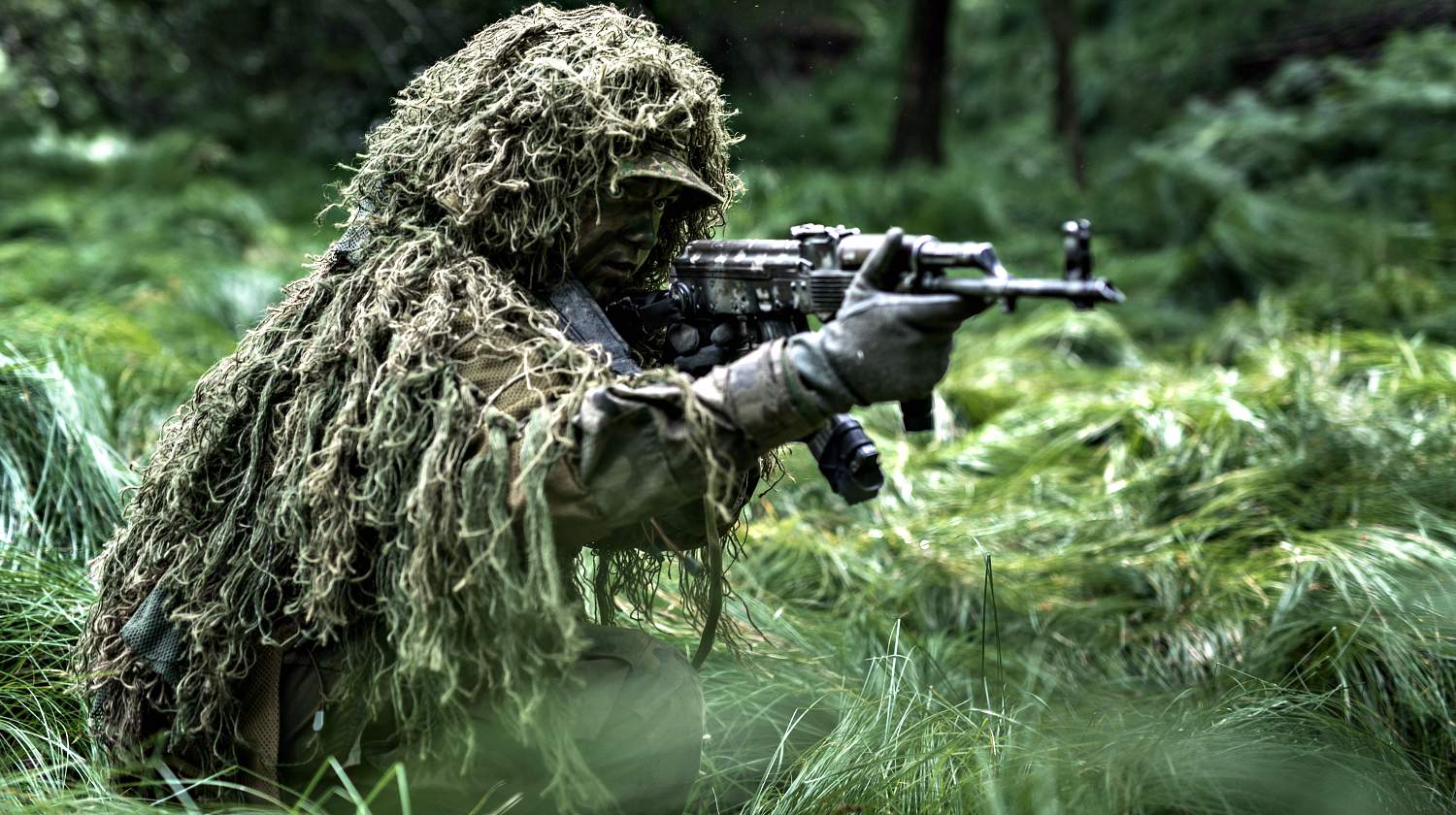 Feature | Soldier dressed in ghillie camouflag | How To Make A Ghillie Suit From Scratch