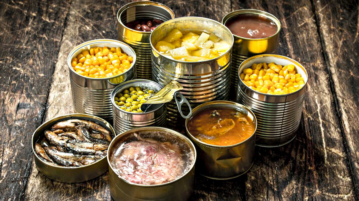 Feature | Various canned vegetables, meat, fish and fruits in tin cans | SURVIVAL SKILLS: Open a Can with Your Bare Hands
