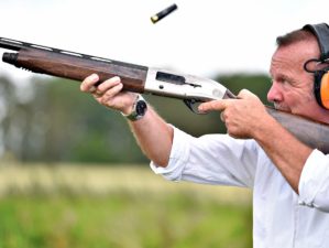 Feature | A man focused on shotgun shooting | Mastering Proper Breathing Techniques To Improve Shot Placement