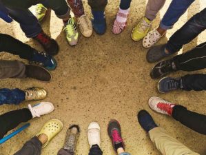Feature | Group of people's feett standing in circle | Minimalist Footwear...An Ultralight Essential? [Gear Review]