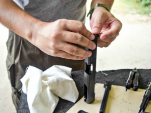 Feature | Man assemble his gun | How To Clean A Gun | Cleaning Tips & Tricks