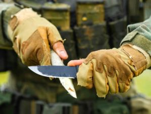 Feature | Soldier with a knife cut a wooden stick | How To Sharpen A Knife At Camp [Video]