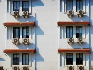 Feature | Hotel window with air conditioner | Ways To Keep Your House Cool During The Summer