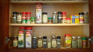 cabinet spices orderly organize food storage tricks Feature pb