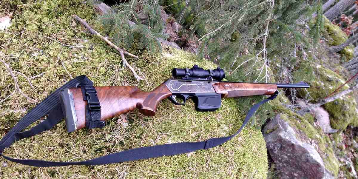 Brown rifle in the forest | .22 Long Rifle: The Ultimate Survival Weapon? 