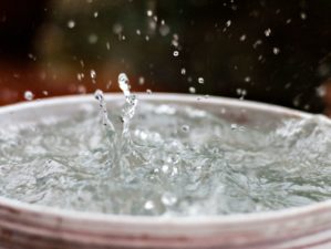 Featured | Rain is falling in a bucket full of water | Year-Old Trick For Filtering Rainwater