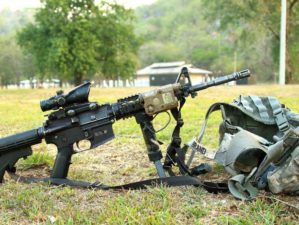 Feature | Armalite and chest holster in the ground | Best AR 15 Hacks To Unlock Your Gun's True Potential
