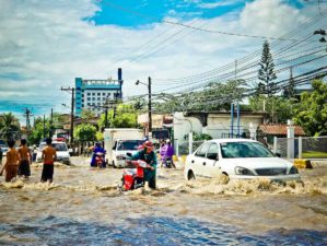 Feature | Flooded street after thunderstorm | Flood Survival Tips | How To Survive Before, During, And After A Flood