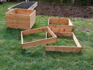plant boxes on a garden | garden design | Grow 100 Pounds Of Potatoes In A DIY Square Garden Design | Grow 100 Pounds of Potatoes | how to grow potatoes | Featured