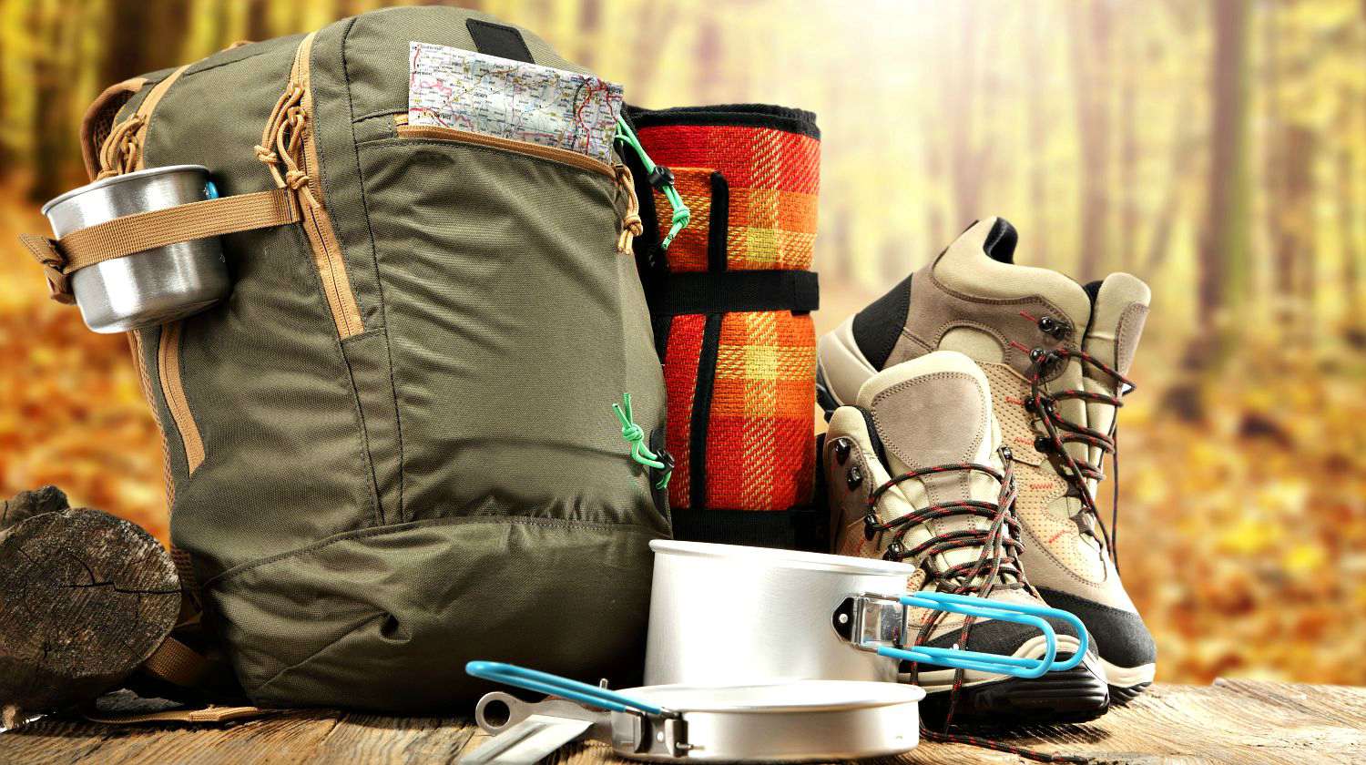 Sunny day in forest and shoes, backpack and plate | Camping Gears | Camp Like A Genius With These Additions | Featured