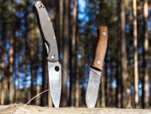 Featured | Two hunting knives inserted in wood | Breakthrough: How To Sharpen A Knife Without A Sharpener