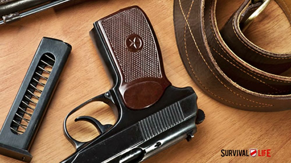 Feature | handgun and a gun belt | The 5 Best Concealed Carry Tips for Responsible Gun Owners | concealed carry laws by state
