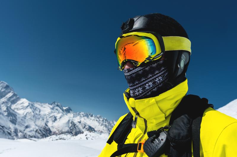 close-portrait-skier-mask-helmet-closed | winter essentials