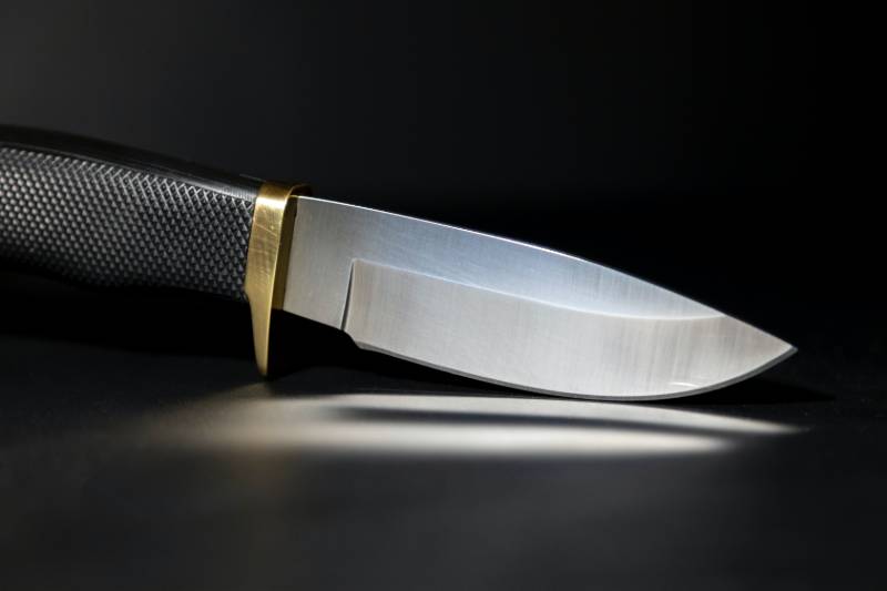 silver and black kitchen knife | Montana Knife Laws