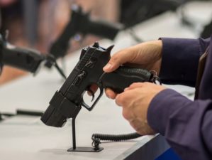 gun-his-hand-exhibition-sale-weapons taurus firearm recall | featured