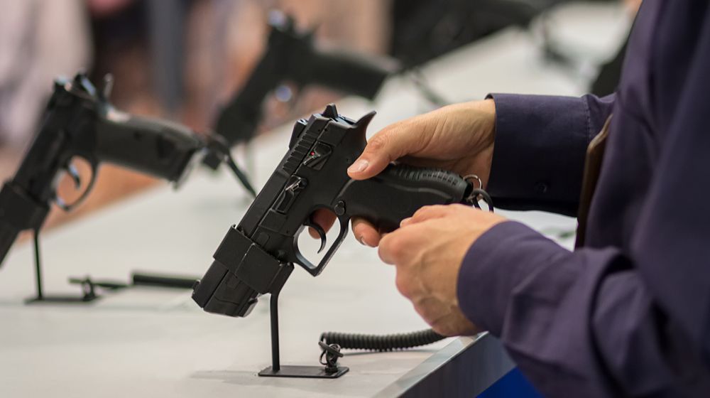 gun-his-hand-exhibition-sale-weapons taurus firearm recall | featured