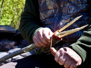 man making fishinghunting spear outdoors survival | How To Make A Spear | DIY Survival Spear | featured
