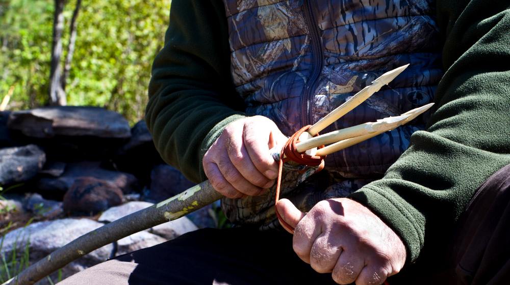 man making fishinghunting spear outdoors survival | How To Make A Spear | DIY Survival Spear | featured