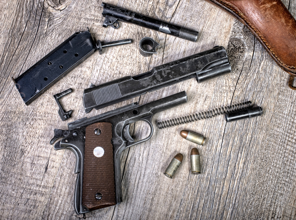 Disassembled Handgun | The Difference Between Striker-Fired And Hammer-Fired