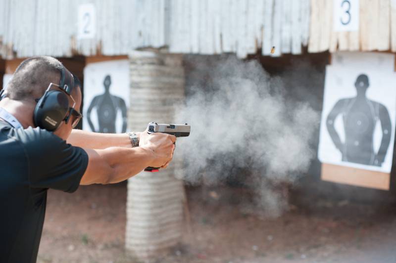police-special-operations-practicing-fire-pistol | investing in guns