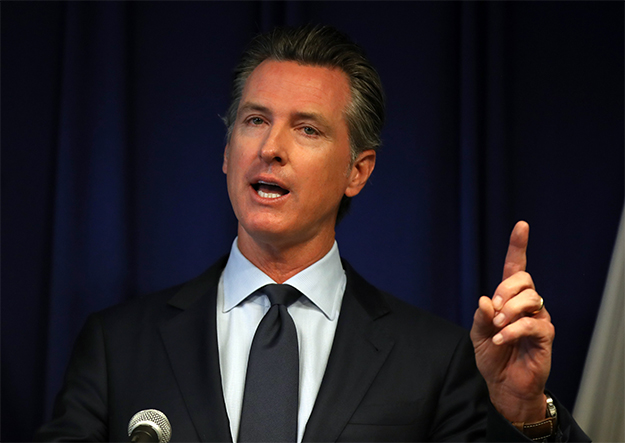 Background | Newsom Signs Bill On Gun Tracing Technology, Conflicts With NRA