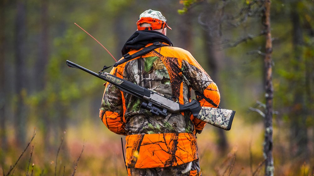 Hunter in the fall hunting season | featured
