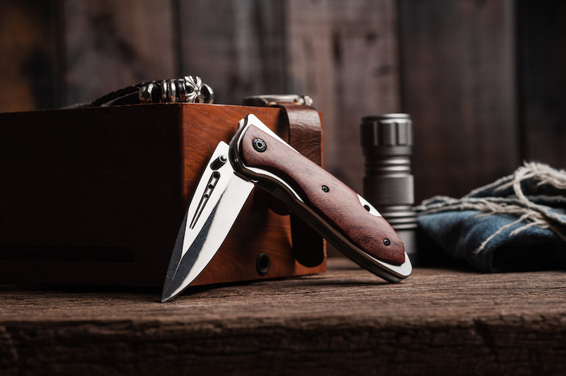 stainless steel folding knife with wooden handle | deer camp gear list