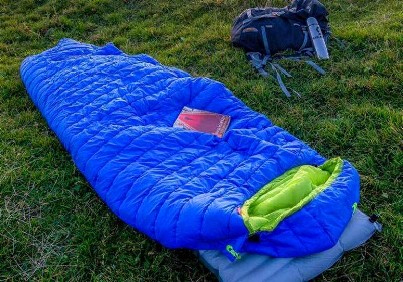 sleeping bag on grass | sleeping bag