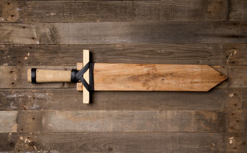homemade-wooden-sword-lying-on-old | homemade weapon