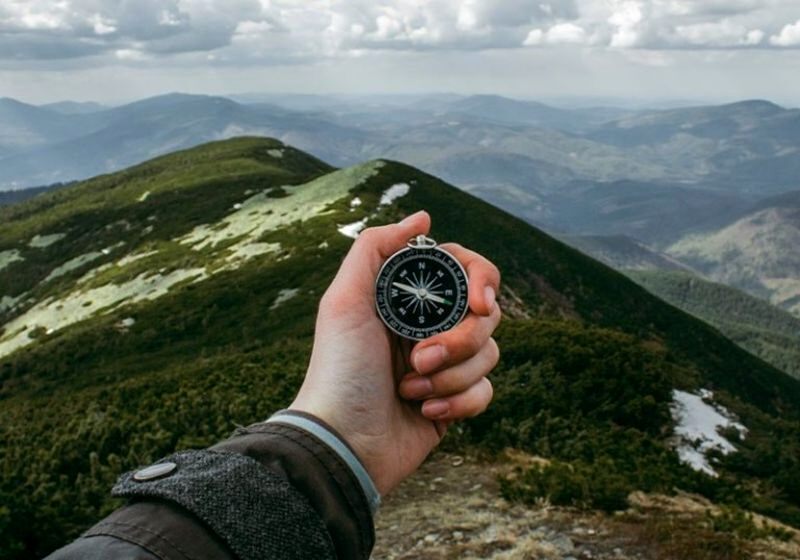 compass in mountains | backpacking gears