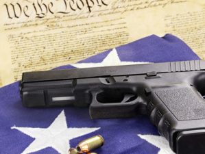 45-caliber-handgun-ammunition-resting-on | Our 2A Rights Under Assault? | Gun Freedom Radio [LISTEN] | Featured