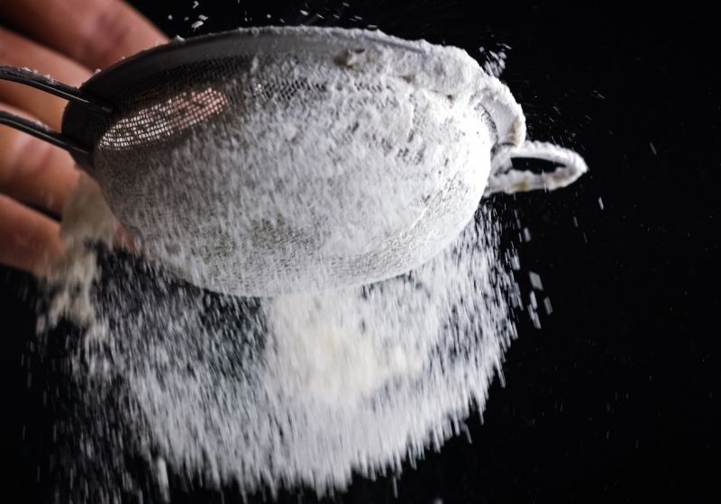 Cook hands sifting flour or sugar How to make gun powder SS