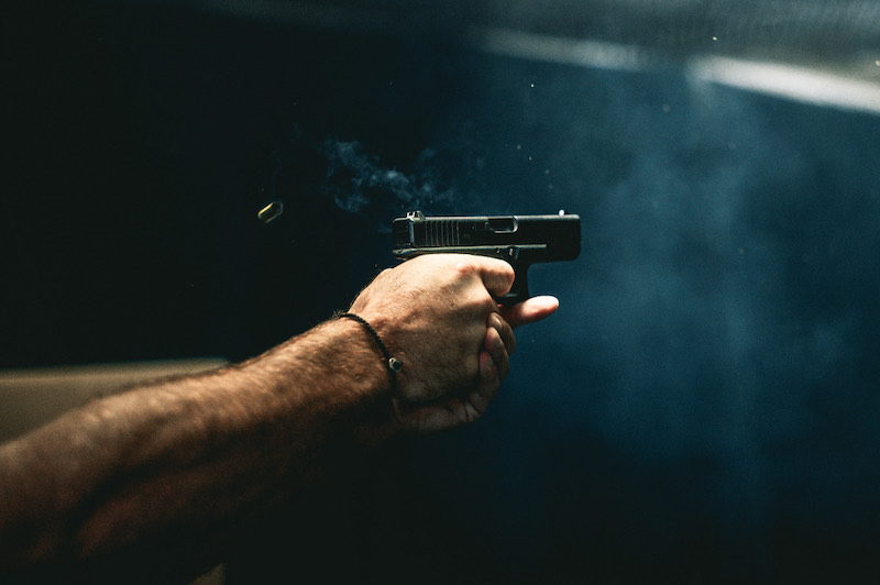 close up on a guy shooting firearm handgun | Jericho 941 fs9