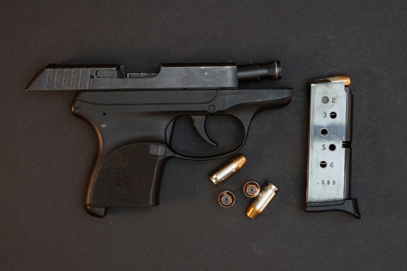 Black automatic hand gun with ammo and magazine | ruger 380 acp