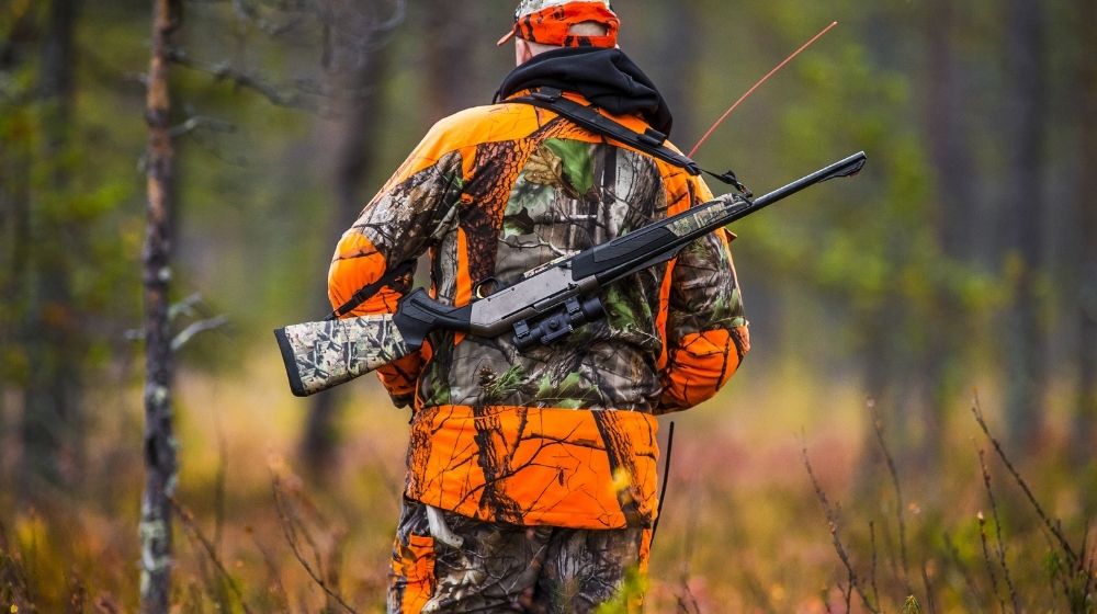 Hunter in the fall hunting season | Best Caliber for Hunting | Featured