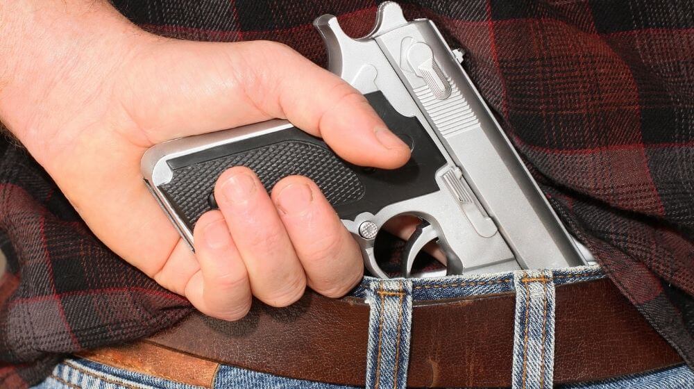 Pistol Concealed in a Man's Waistband | Is a 25 Caliber Good for Self Defense?| Featured