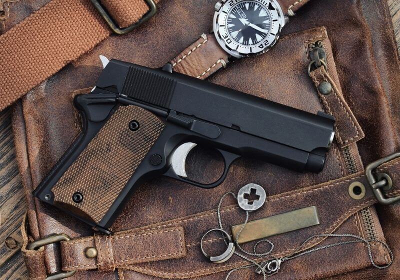Small black gun compact handgun 25 Caliber SS