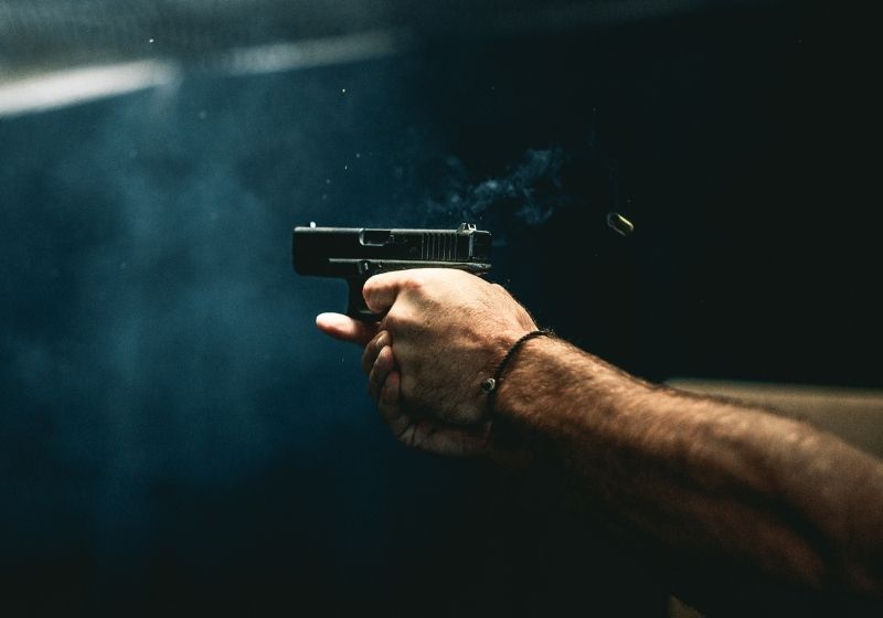 Close up on a guy shooting firearm handgun Sig Sauer P365 vs Glock 43 SS