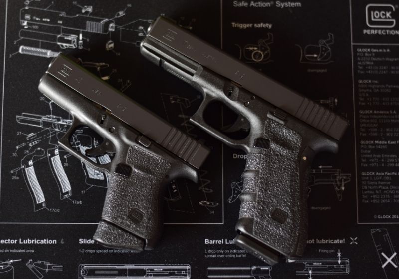 Two firearms Glock pistols Sig Sauer P365 vs Glock 43 SS