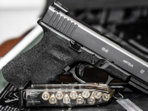 Glock 19 handgun with green night sights | PSA Dagger 9 Gun Review | featured