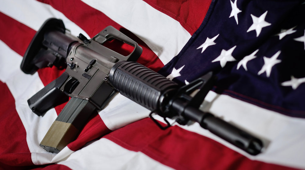 Flag of the USA with rifle | Top 10 Best Ar-15 Pistols In The World 2021 | featured
