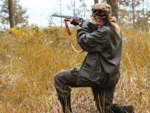Woman hunter in the woods | 6 Best Shotguns for Women | How to Find the Best Shotgun for Women | Featured