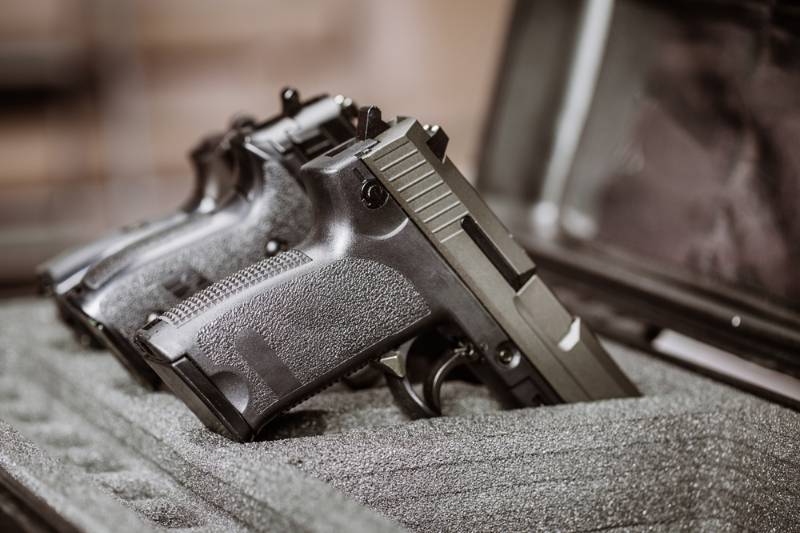 black-handgun-plastic-secure-storage-case gun law ss