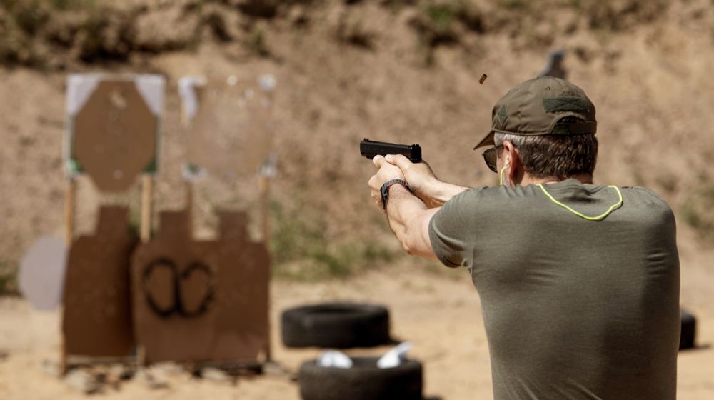unrecognisable-man-practising-shooting-pistol-rangeMicro-Compact Pistol | Featured