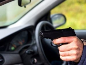 Man with a gun driving a car male hand with a gun |Mouse Gun | Top 10 Best Mouse Gun | Featured