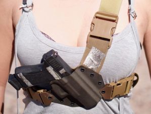 asian woman wearing pistol chest holster | S&W M&P 2.0 10mm Gun Review | Featured