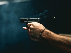 Close on guy shooting firearm handgun | Best 7 Wilson Combat Pistols for 2022 | Featured