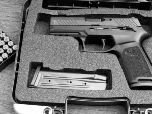 Guns and ammunition in the safe box | Pistol Case | Top 5 Best Pistol Cases in 2022 | Featured