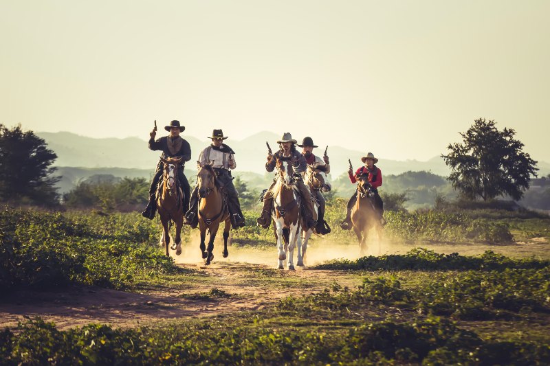 Group of Cowboys Riding Horse | Ruger Wrangler Review